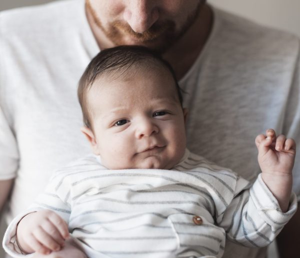 close-up-father-looking-his-baby